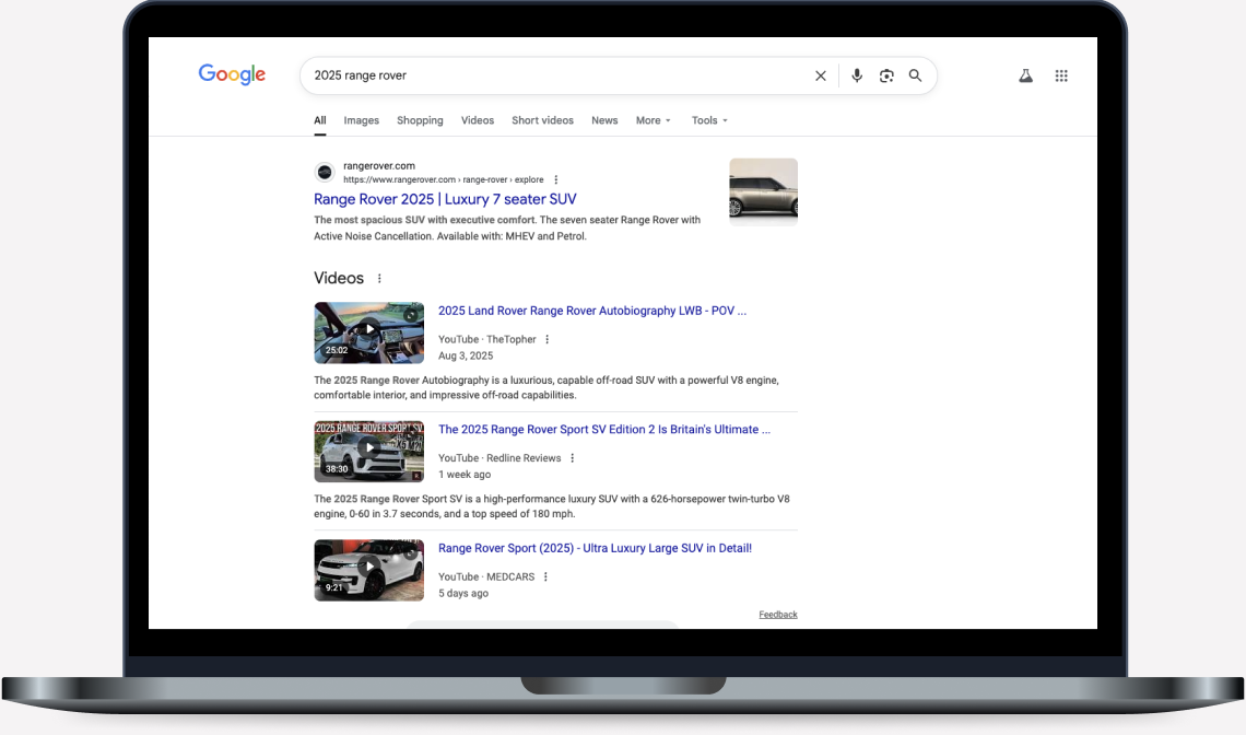 Laptop displaying Google search results for 2025 Range Rover.